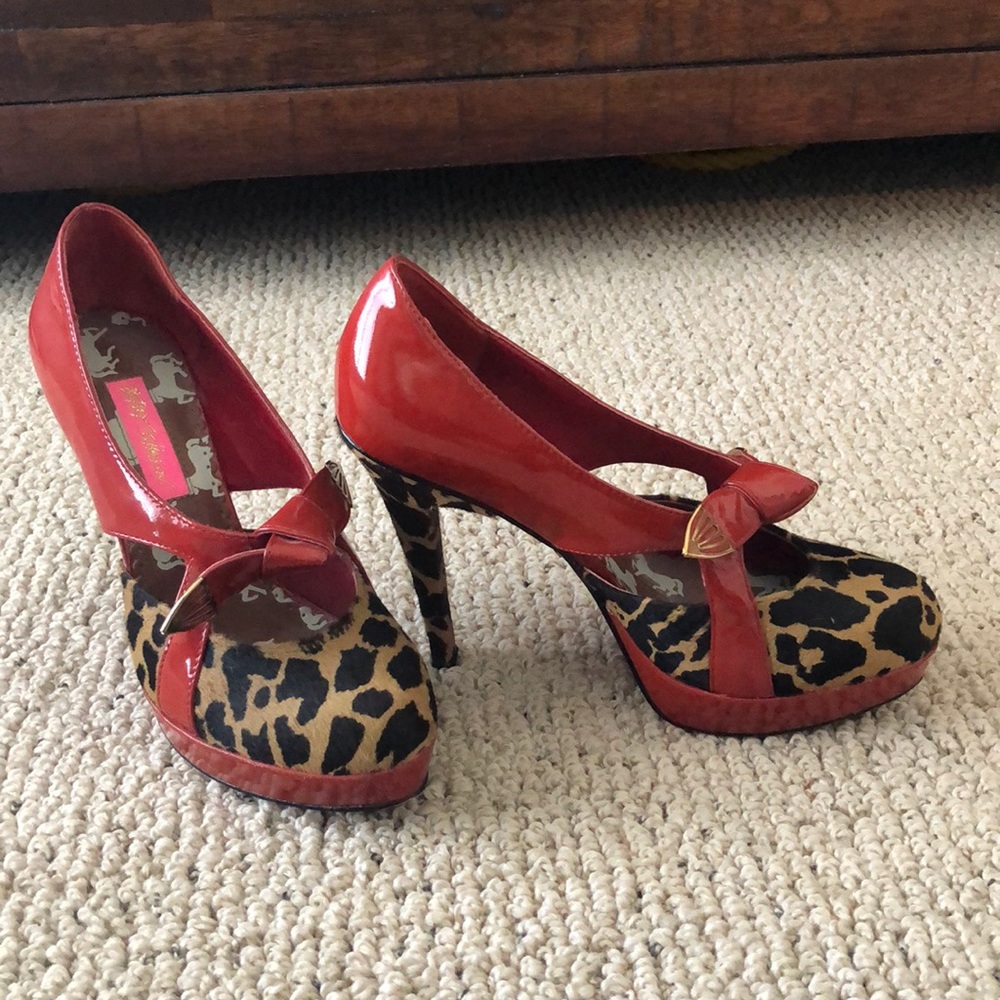 Red patent leopard pumps